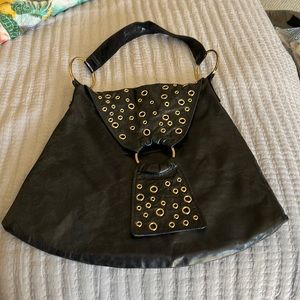 Sabina New York black leather gold stud hand bag.